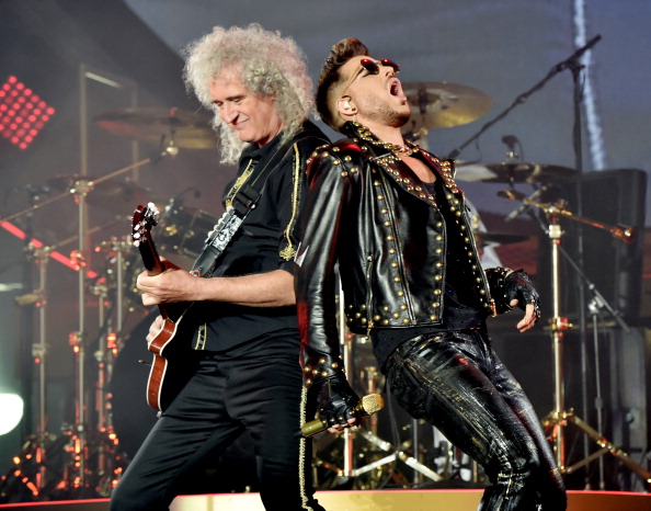 INGLEWOOD, CA - JULY 03:  Musician Brian May (L) of Queen and singer Adam Lambert perform at the Forum on July 3, 2014 in Inglewood, California.  (Photo by Kevin Winter/Getty Images)